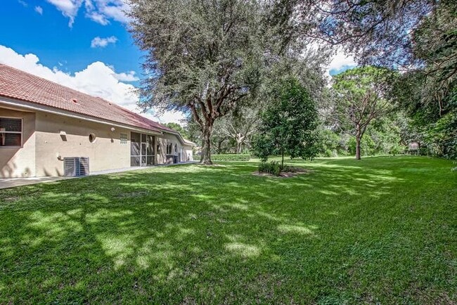 Building Photo - Stunning 5-Bedroom Pool Home on Nearly 2 A...