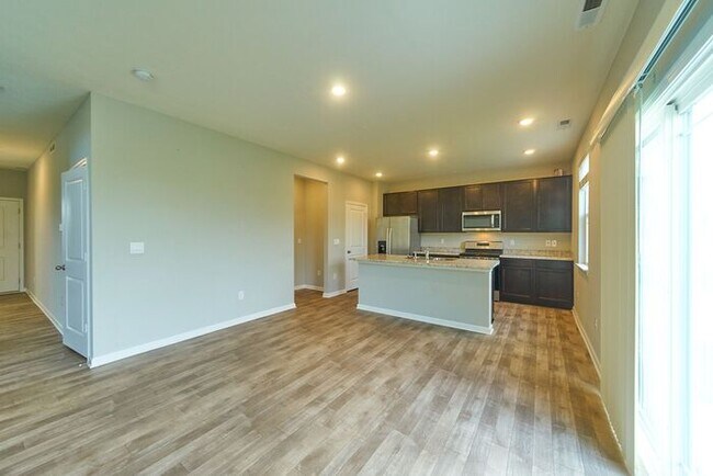 Building Photo - 4 Bedroom at Trotter's Landing in Camby With Pond View!