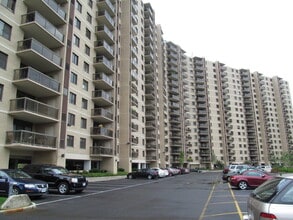 Building Photo - LIKE LIVING IN A LUXURY RESORT ALL YEAR ROUND