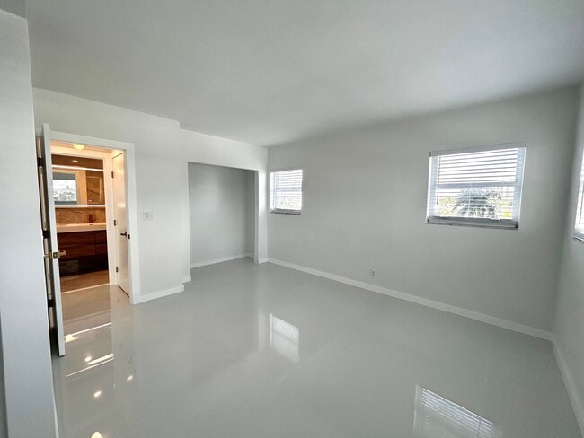 Building Photo - Fully Renovated East-Facing 2BR/2BA + Bonus Room | Ocean Views | In-Unit W/D