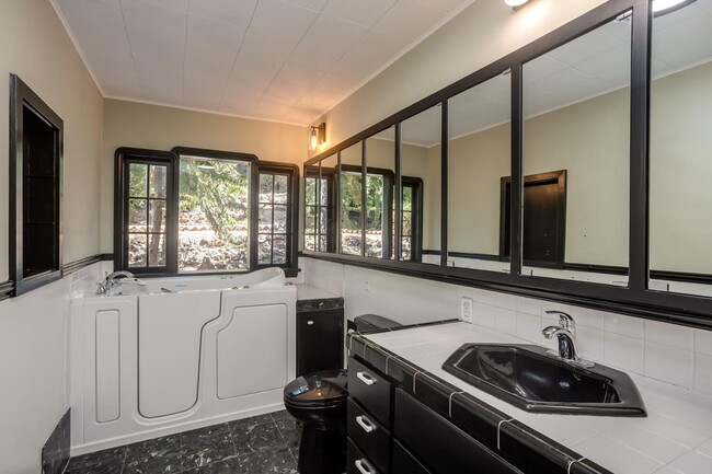 Building Photo - MUST SEE! Unique and Charming 4 bedroom 2.5 Bath Home w/Stunning Views!