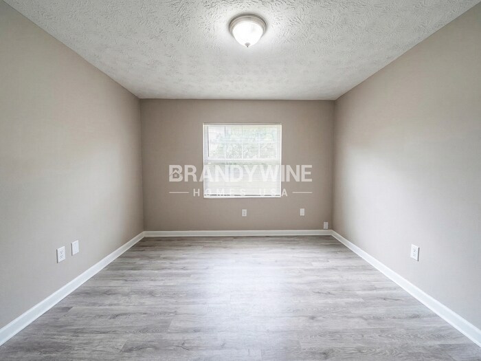 Building Photo - 8409 Red Holly Ln