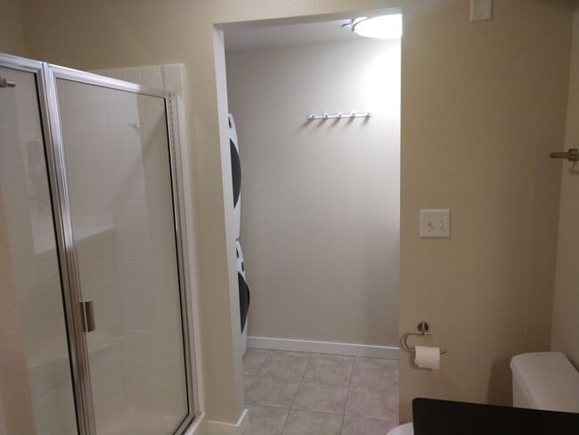 Building Photo - SAVE MONEY ON EXTENDED STAYS.  Beautiful Furnished and Completly Supplied Condo in Downtown Misso...