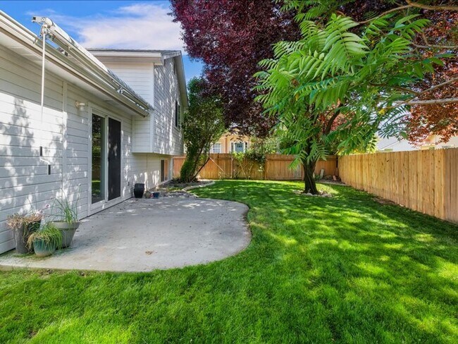 Building Photo - June Rent Free!!  Move Today!  Four Bedroom, Three Bath Home with Beautiful Backyard, Two Car Gar...