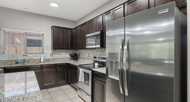 Building Photo - 9309 W Orange Dr