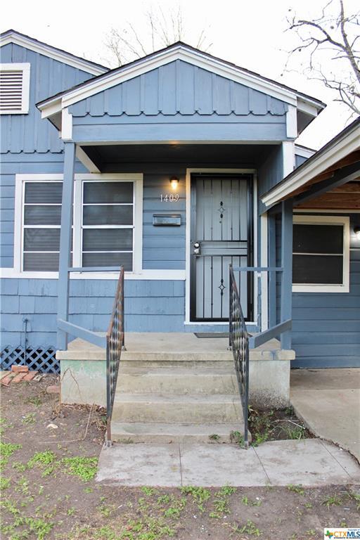 Building Photo - 1409 E Mistletoe Ave