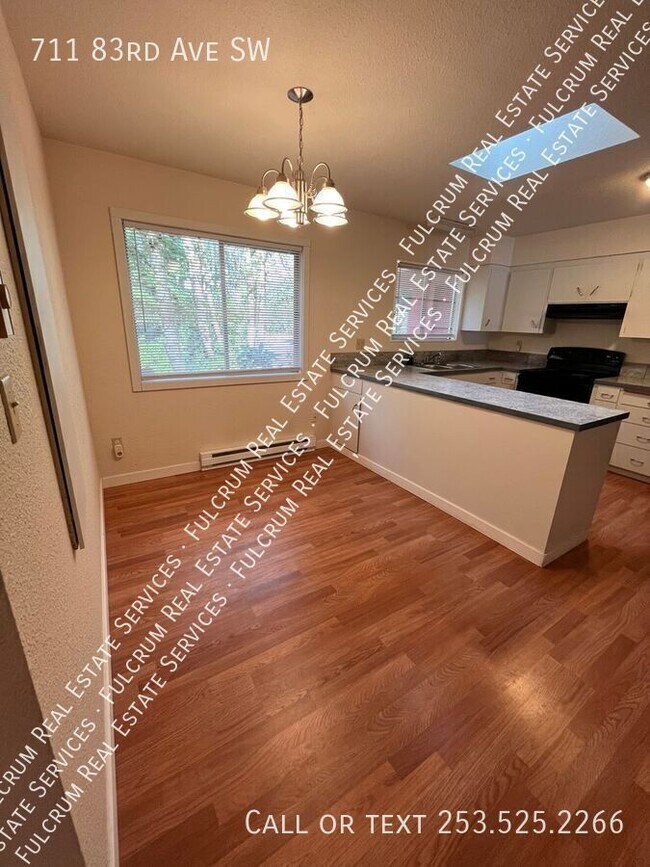 Building Photo - 711 83rd Ave SW