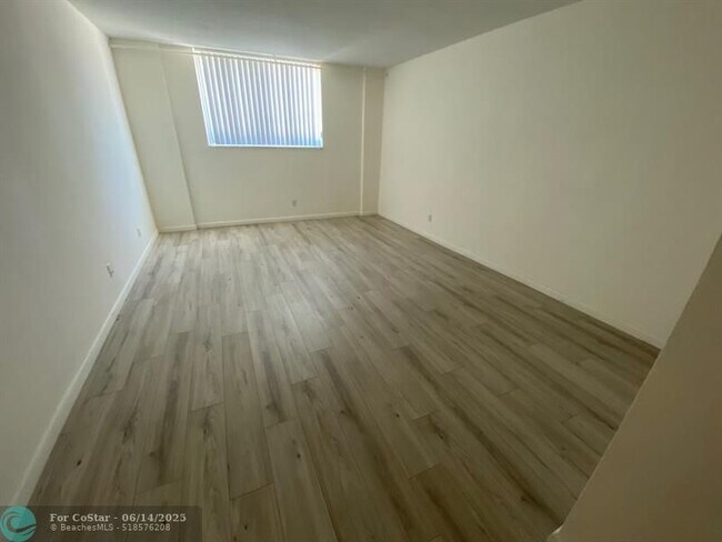 Building Photo - 19380 Collins Ave