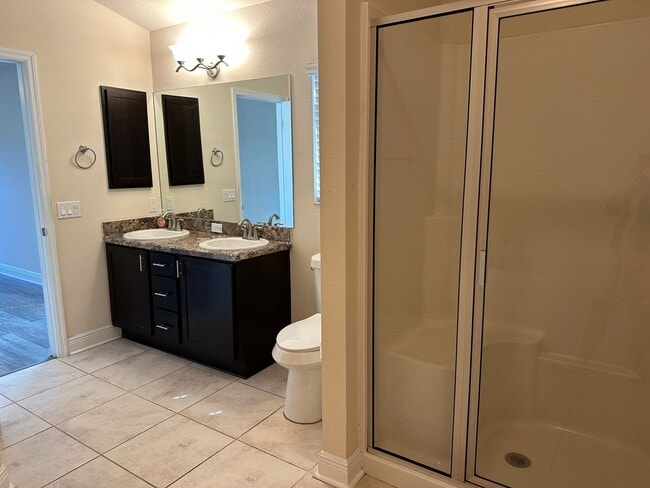 Building Photo - Spacious 4 Bedroom Home with Fenced Yard a...