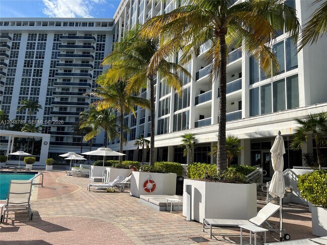 Building Photo - 10275 Collins Ave