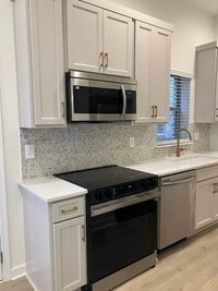 Building Photo - Price Improvement! New Condo In Spring Hil...