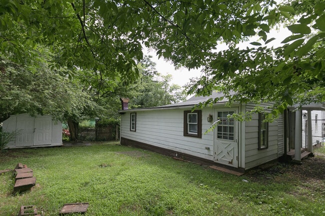 Building Photo - Four-Bedroom Bungalow with Fenced Yard Near Downtown Durham!