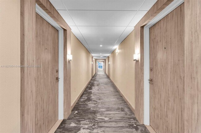 Building Photo - 10275 Collins Ave