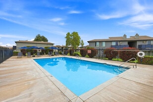 Outdoor Pool - Highlander Apartments