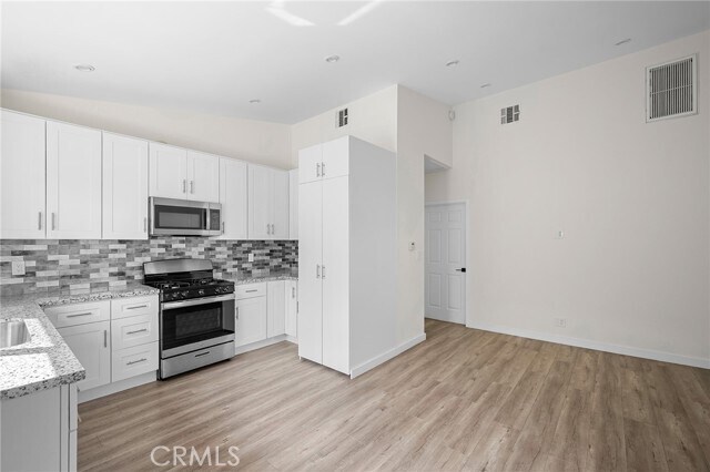 Building Photo - 10321 Sherman Grove Ave