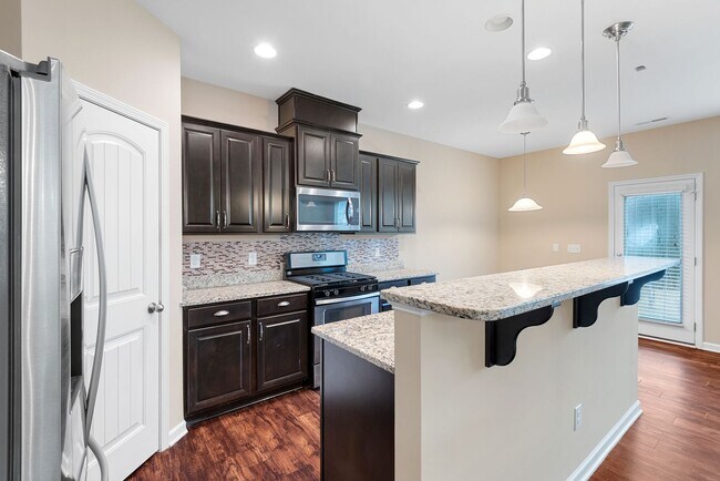 Building Photo - Beautiful 4BR, 2.5BA End Unit Townhome in East Raleigh - Available Now!