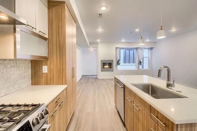 Building Photo - Modern LoHi Living with Rooftop Deck & City Views!!