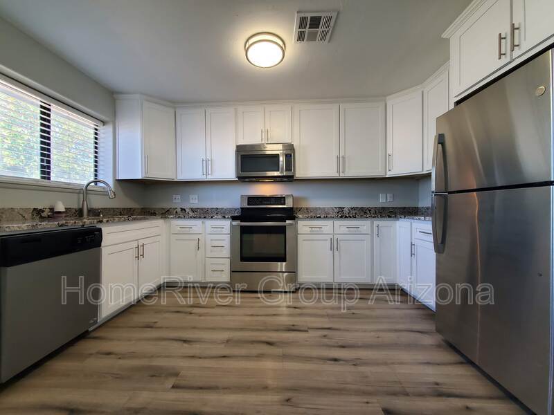 Building Photo - 4023 N 80th Dr