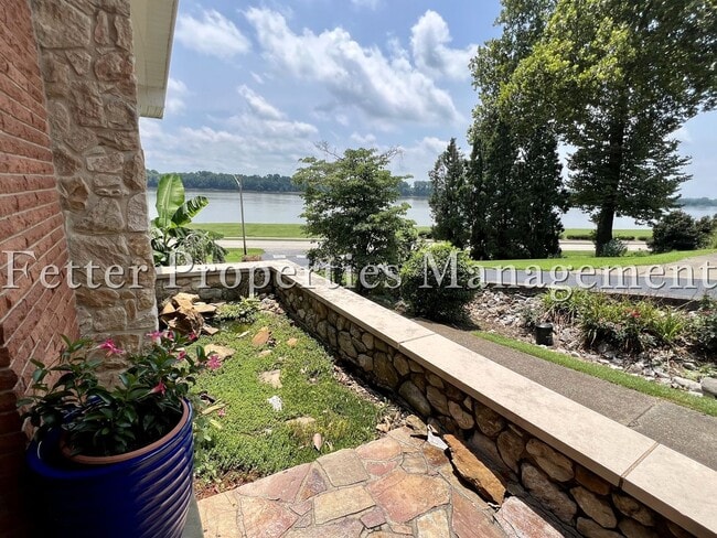 Building Photo - Riverfront Living with Mid-Century Flair
