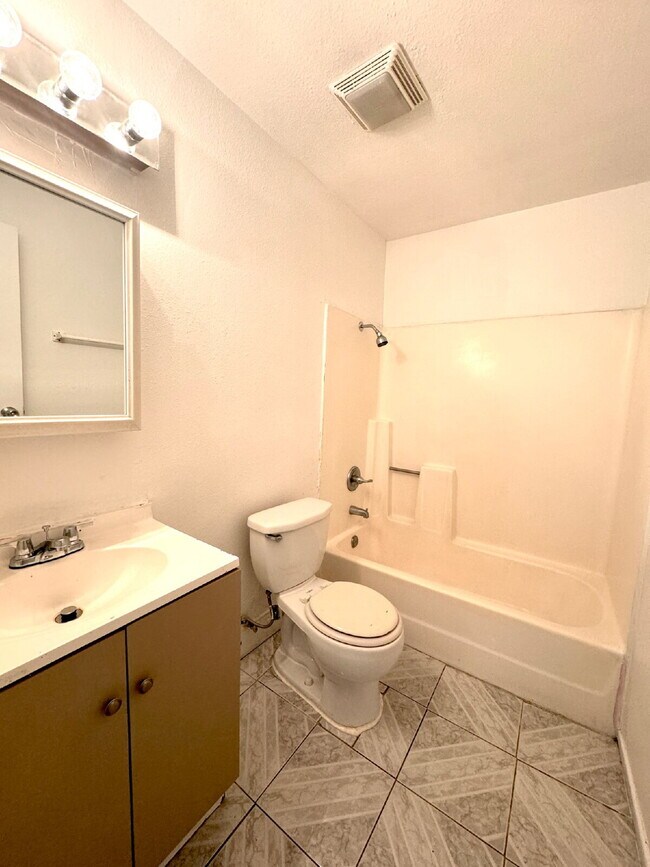 Building Photo - DOWNSTAIRS CONDO | RECENLY REHABBED 2 BEDROOM 1 BATH | ACROSS FROM CSN CHEYENNE