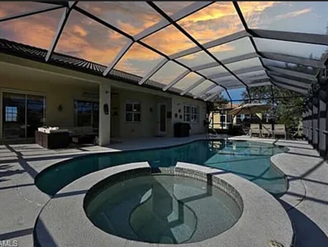 Building Photo - Lakefront 3 Bed + Den 2 bath home with pool and spa tub in Waterways of Naples Community