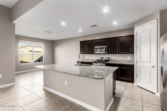 Building Photo - 37728 W San Capistrano Ave