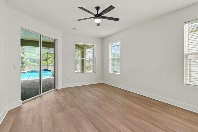 Building Photo - Expansive 4 bedroom, 3 bath remodeled home in gated community