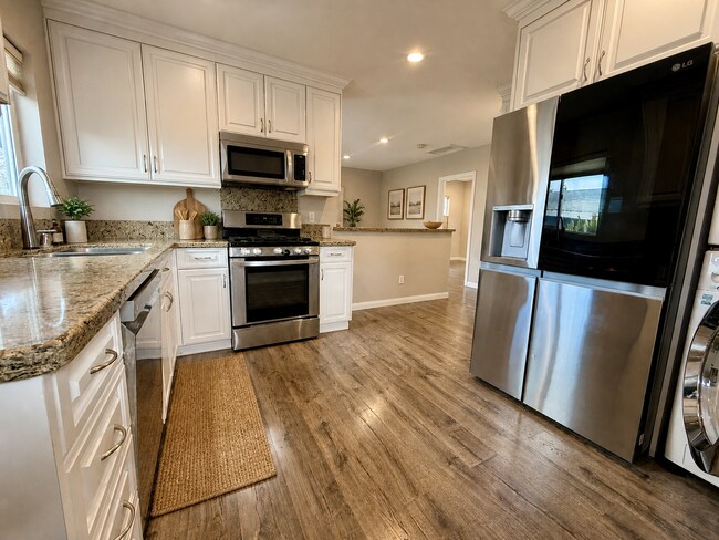 Building Photo - Cottage Home in Normal Heights! Conveniently offers A/C, in Unit Washer/Dryer, Assigned Parking P...