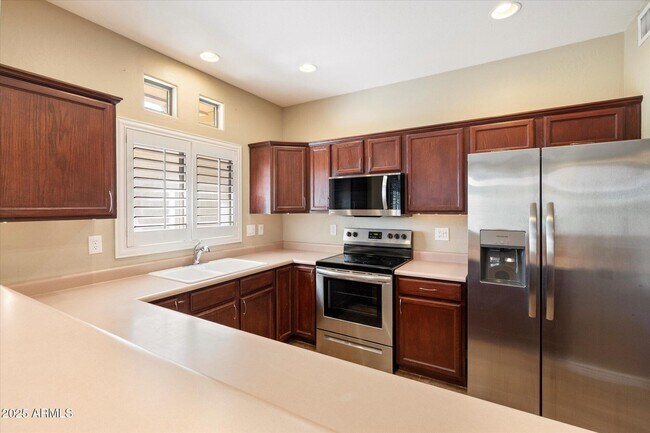 Building Photo - 9100 E Raintree Dr