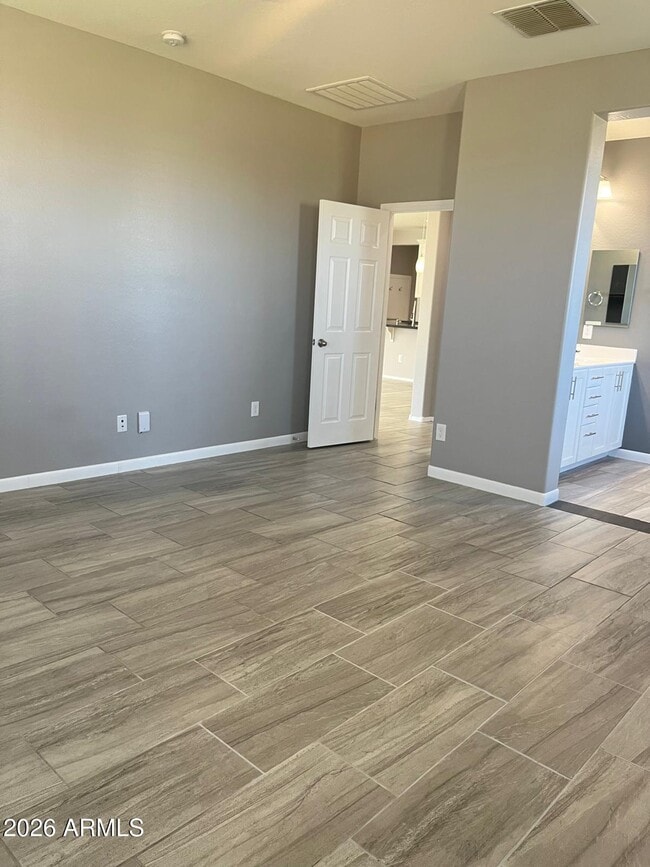 Building Photo - 8503 W Peppertree Ln