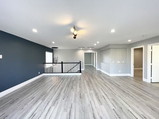 Building Photo - Welcome to a stunning 4-bedroom, 3-bath Home