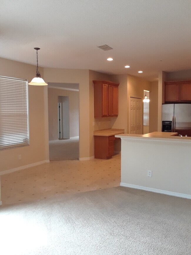 Building Photo - Spacious 4-Bedroom Pool Home with 3-Car Ga...