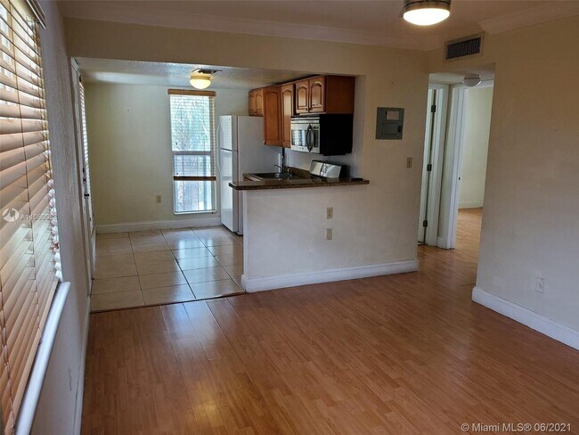Building Photo - 241 S Royal Poinciana Blvd