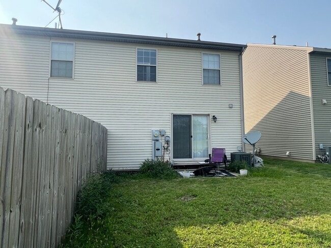 Building Photo - 4 Bedroom, 2.5 Bath Townhome - Available A...