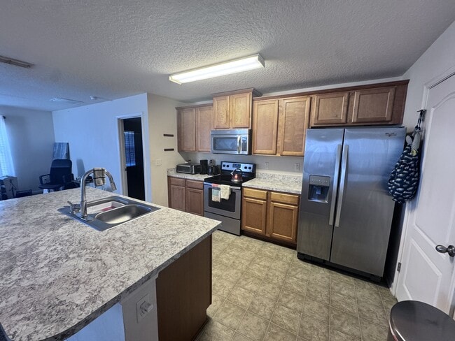 Building Photo - 15373 Bareback Dr