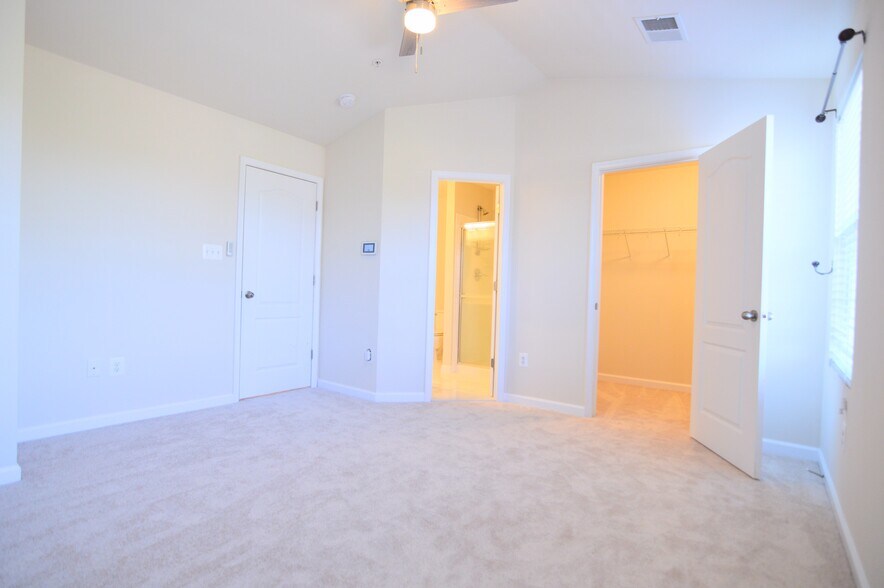 Master Suite with en-suite bathroom (to left) and walk in closet (to right) - 11696 Palm Desert Pl