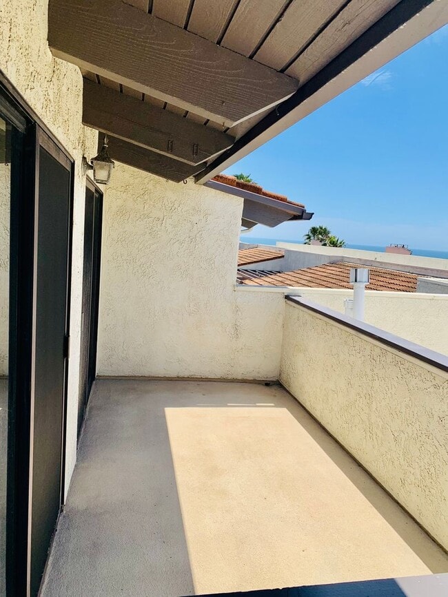 Building Photo - Unbeatable Location! Ocean View two bedrooms and two bathrooms two story condo with gated undergr...