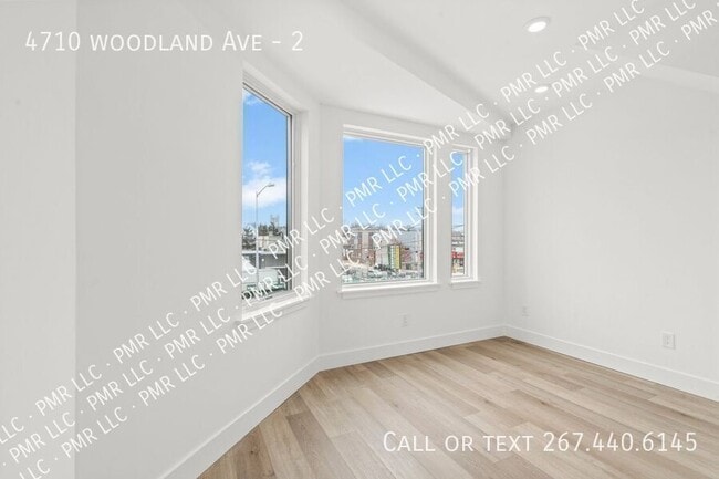Building Photo - 4710 Woodland Ave