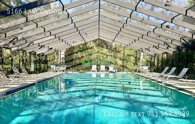 Building Photo - 5166 Lancewood Dr