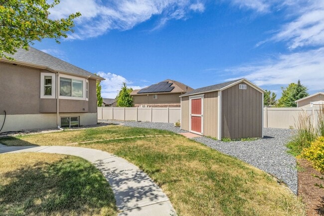 Building Photo - Spacious Syracuse Home with Covered Deck, Loft & Oversized 3-Car Garage