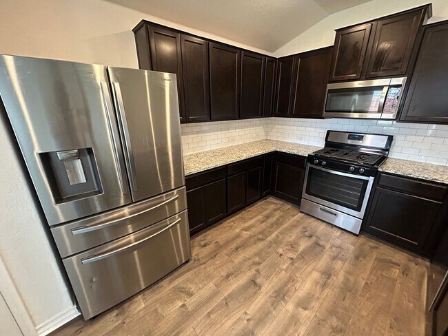 Building Photo - *COMING SOON* 3-Bedroom with Solar Panels & Resort Amenities – Pool, Gym!