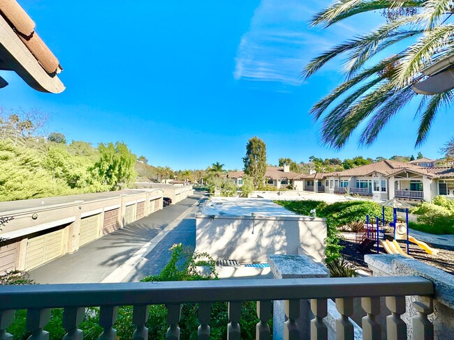 Building Photo - Beautiful Upstairs Condo Unit in the Priva...