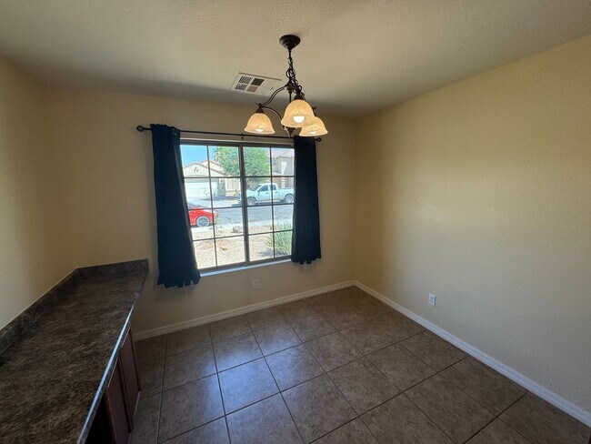 Building Photo - 7371 W Alicia Dr