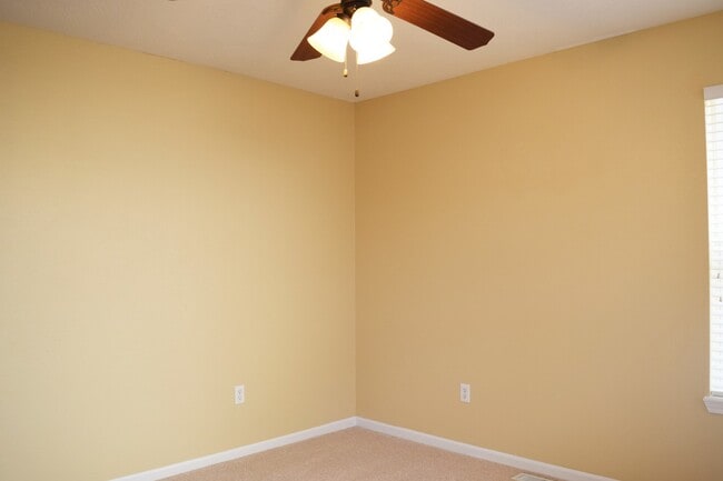 Building Photo - Located in the popular Woodland Hills Subd...