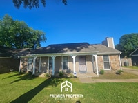 Building Photo - Charming 3BR/2BA Near Kirby | Hardwood Floors, Rustic Fireplace & Large Yard