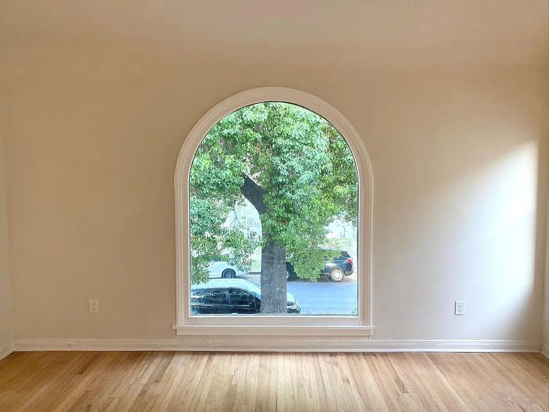 Ample light and views in the huge Spanish style living room - 2807 Hillcrest Dr