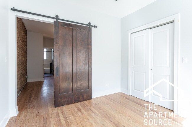 Building Photo - 4011a North Lowell Ave. Unit 3