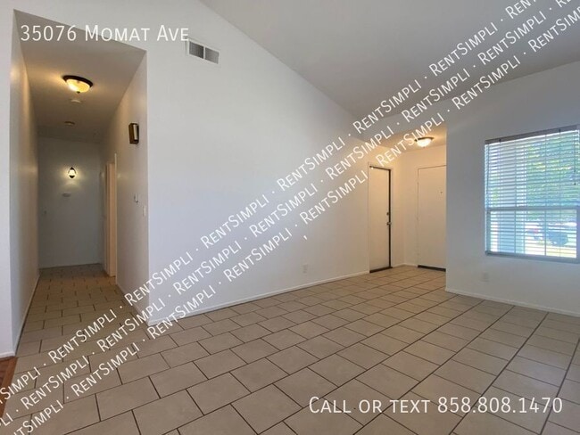 Building Photo - 35076 Momat Ave