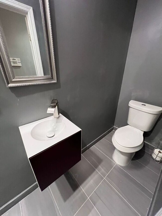 Building Photo - Spacious 2-Bedroom Townhome with Finished Studio Suite – Prime Location!