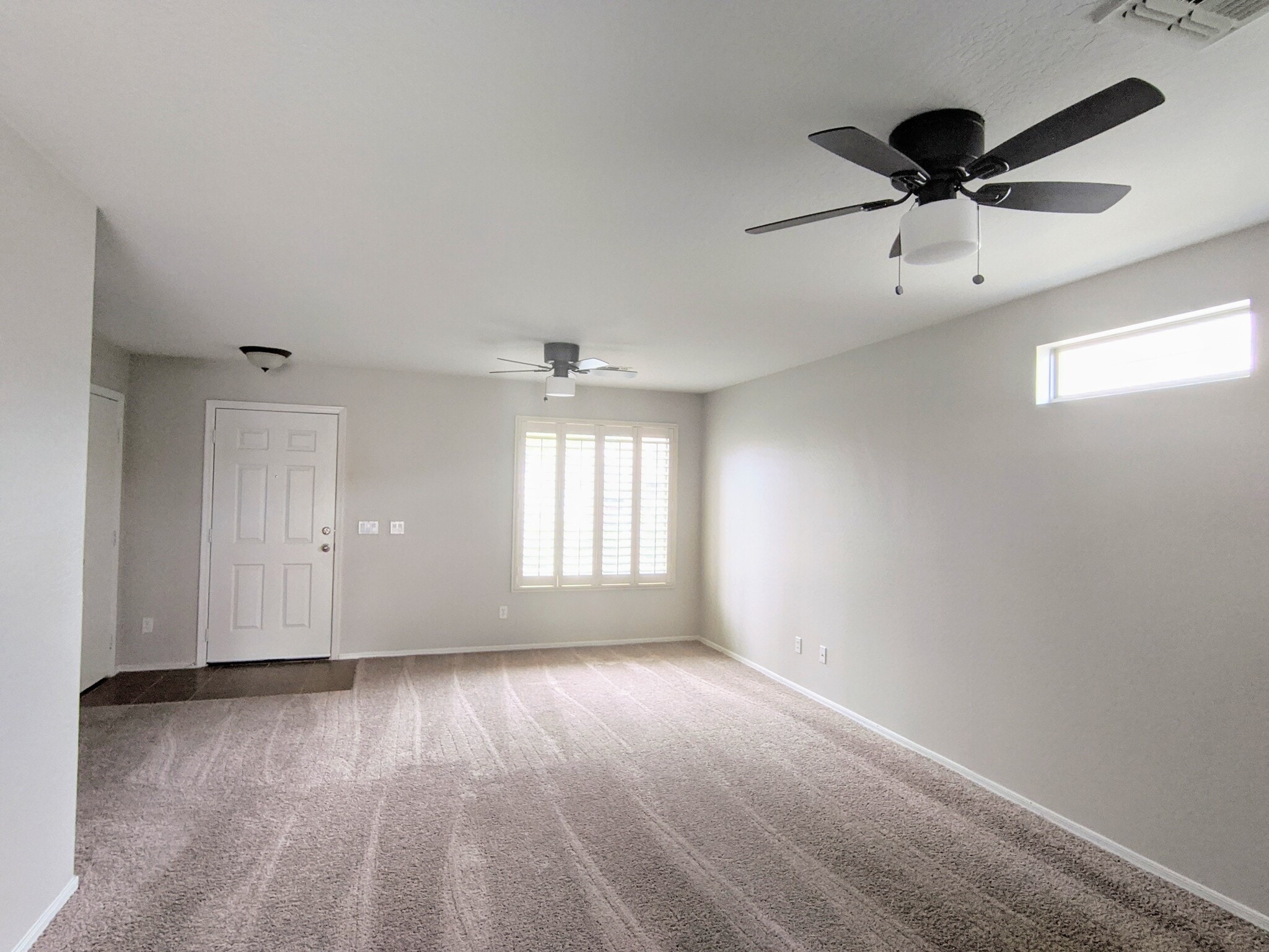 Specious main room with new ceiling fans - 11813 W Maui Ln